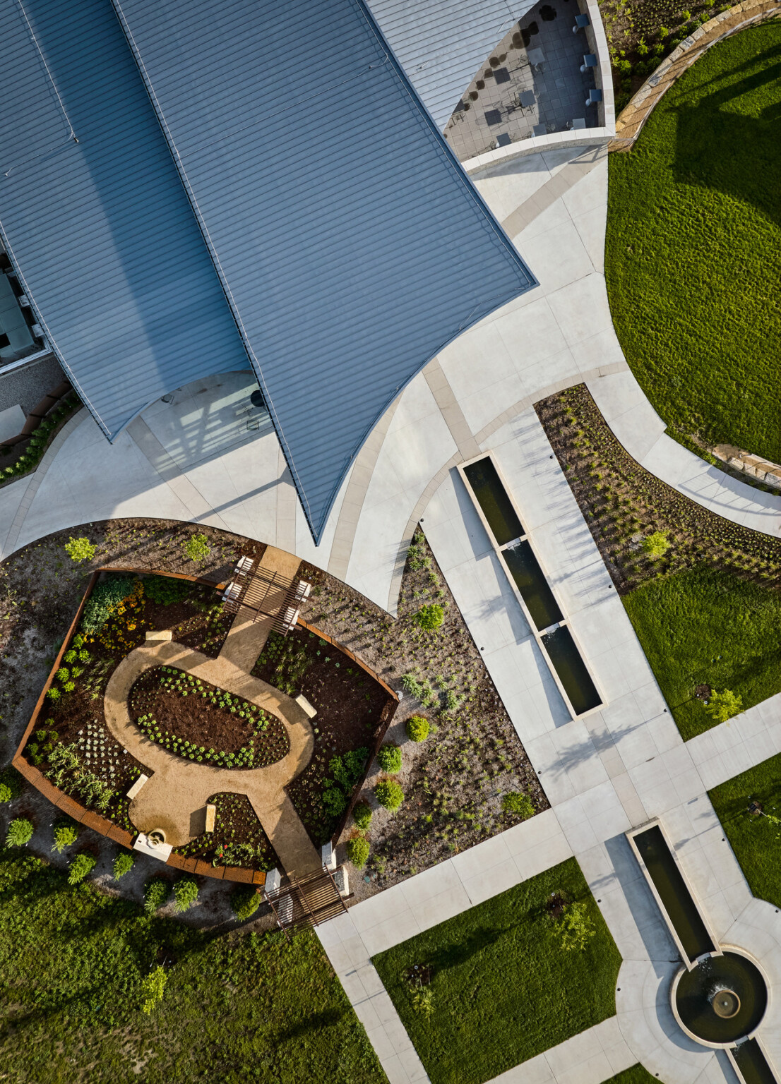 aerial view of building entryway, showcasing form and function; landscape architecture; dlr group design