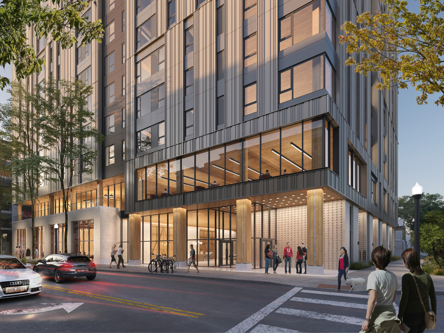 architectural rendering of 9th and High in Columbus, Ohio; mass timber structure entrance with covered awning with people standing underneath