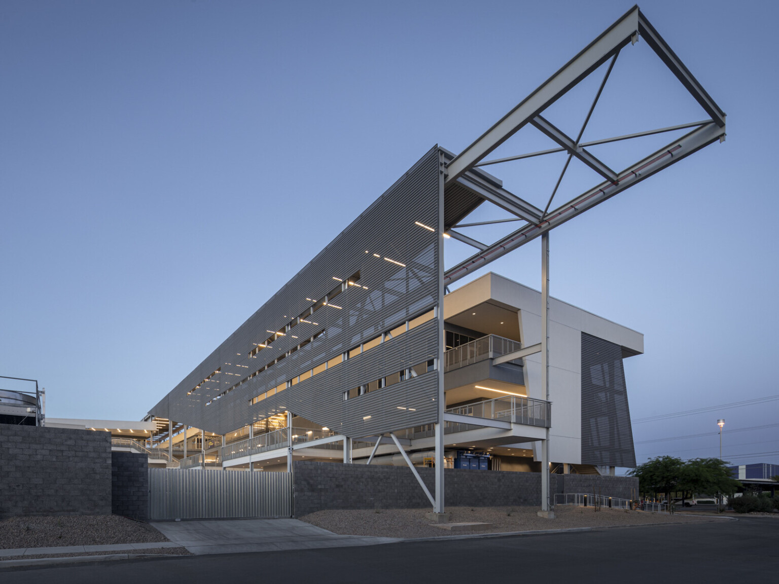 Pima community college; large modern building with exposed steel frame and engineering elements featured