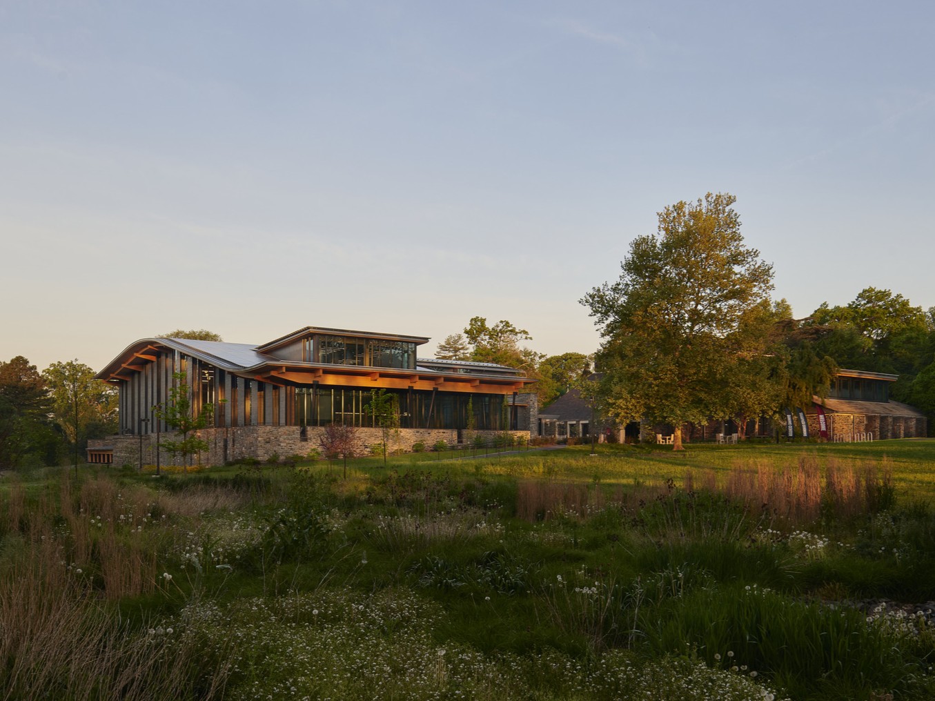 view from the lawn of a sustainable, mass timber building on a university campus, Swarthmore University
