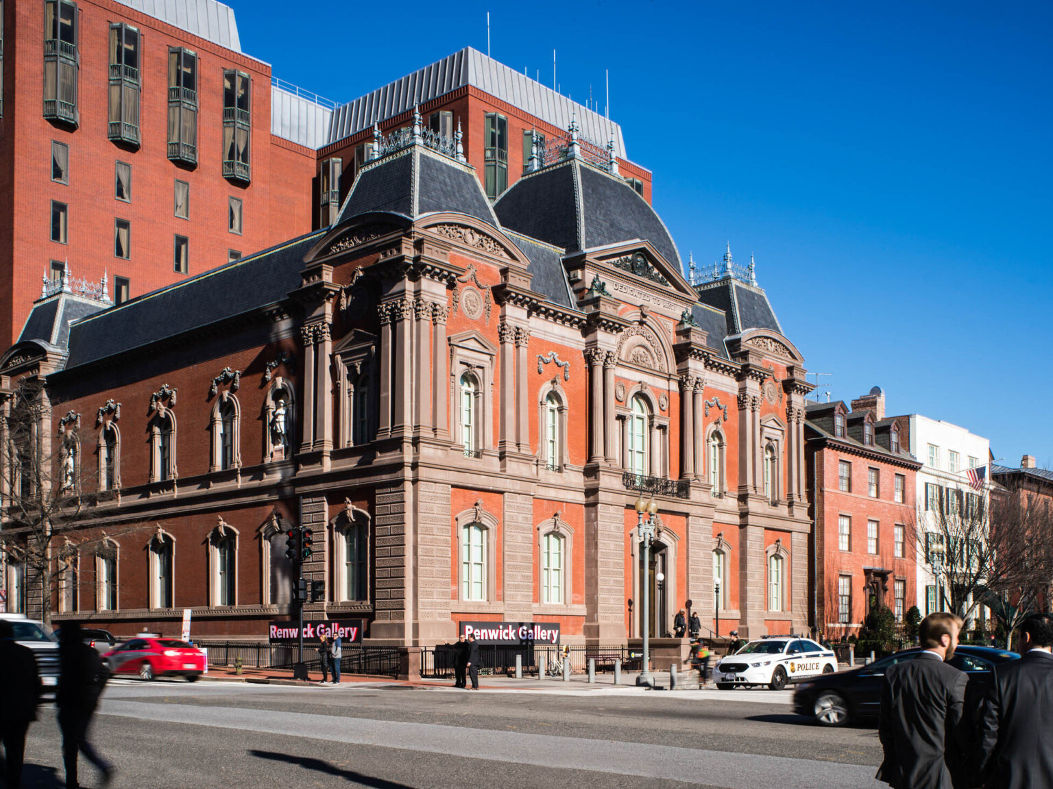 Exterior corner view of Smithsonian American Art Museum's Renwick Gallery from across a busy street