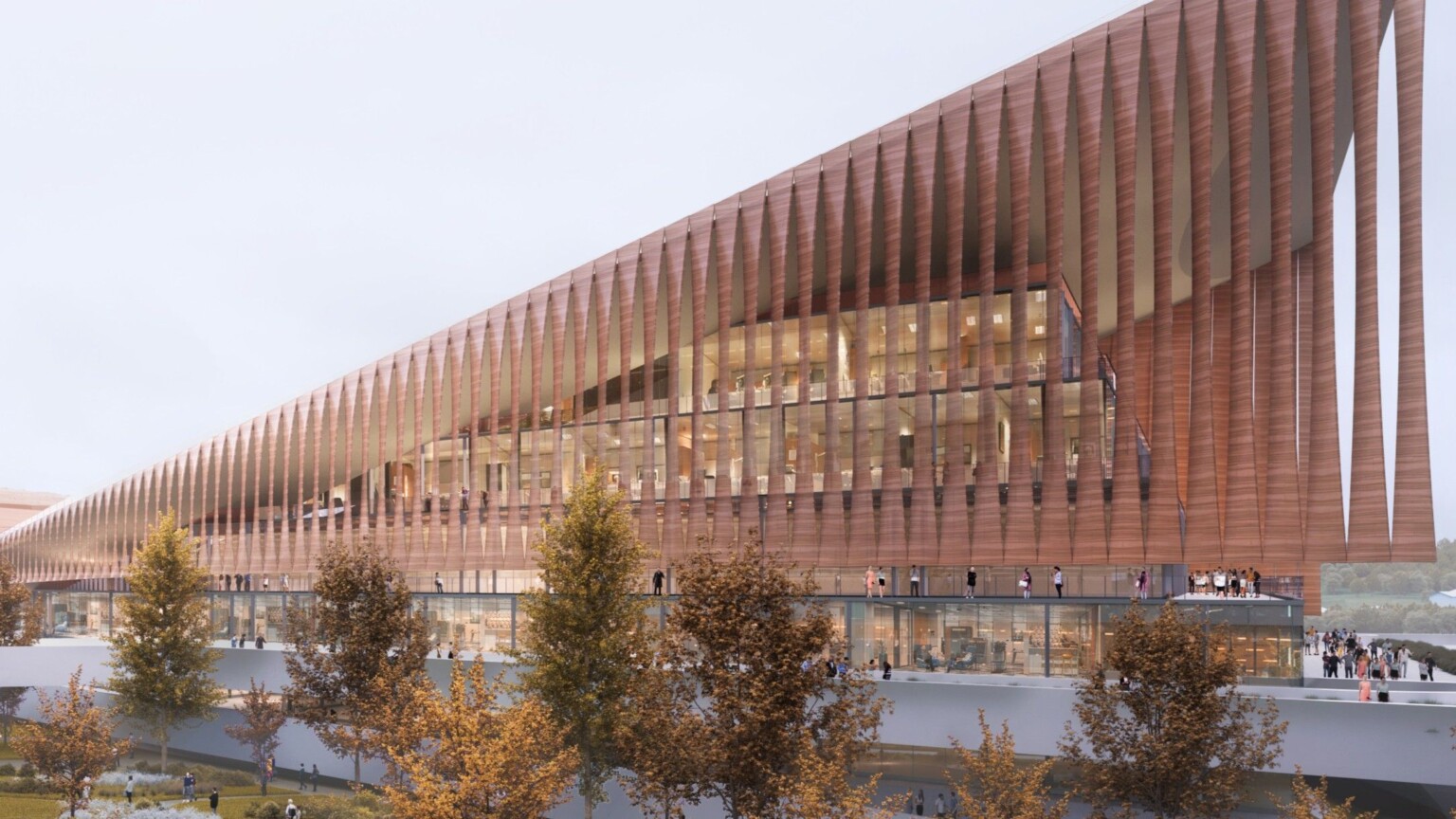 exterior rendering of facade with vertical panels providing shading and passive cooling; warm bronze color, fall trees, and people standing on the balcony create an upscale but inviting urban environment