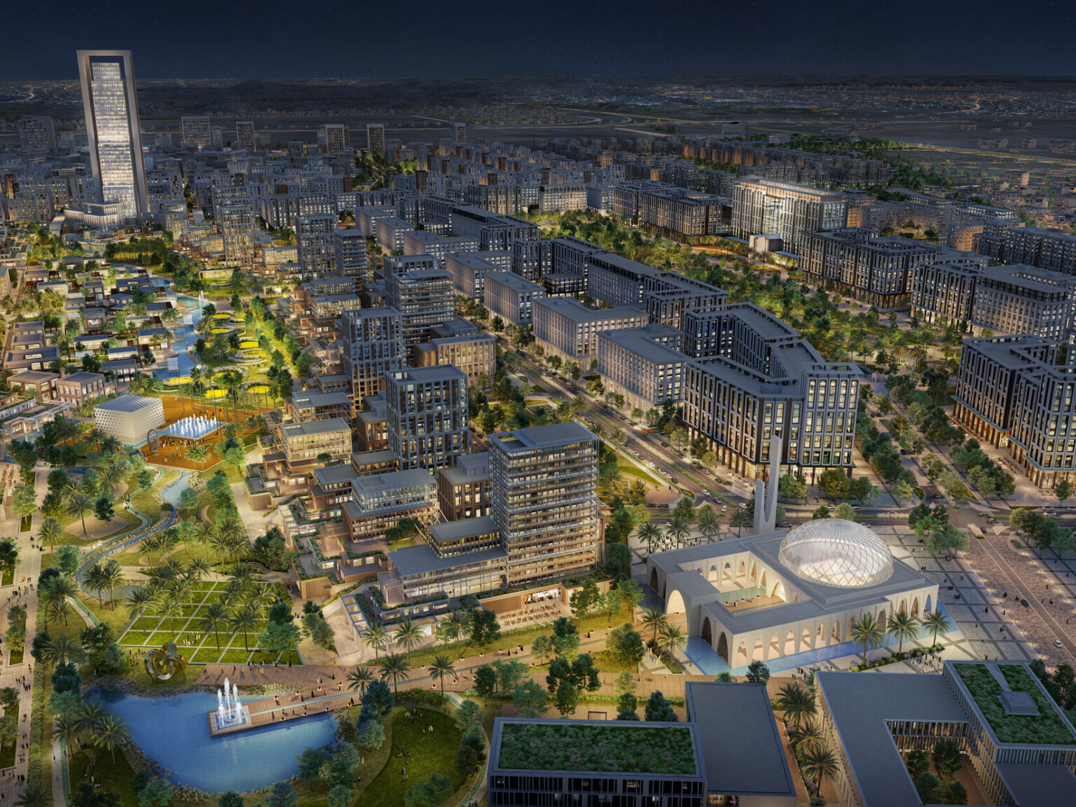 A night-time aerial view of a large urban area illuminated with various lights, highlighting the buildings, streets, and landscaped areas. The master plan features a mix of high-rise and low-rise buildings with contemporary architecture.