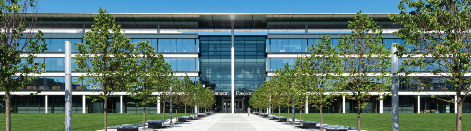 Walkup pathway flanked with trees to the CC-CWRU Sheila & Eric Samson Pavilion