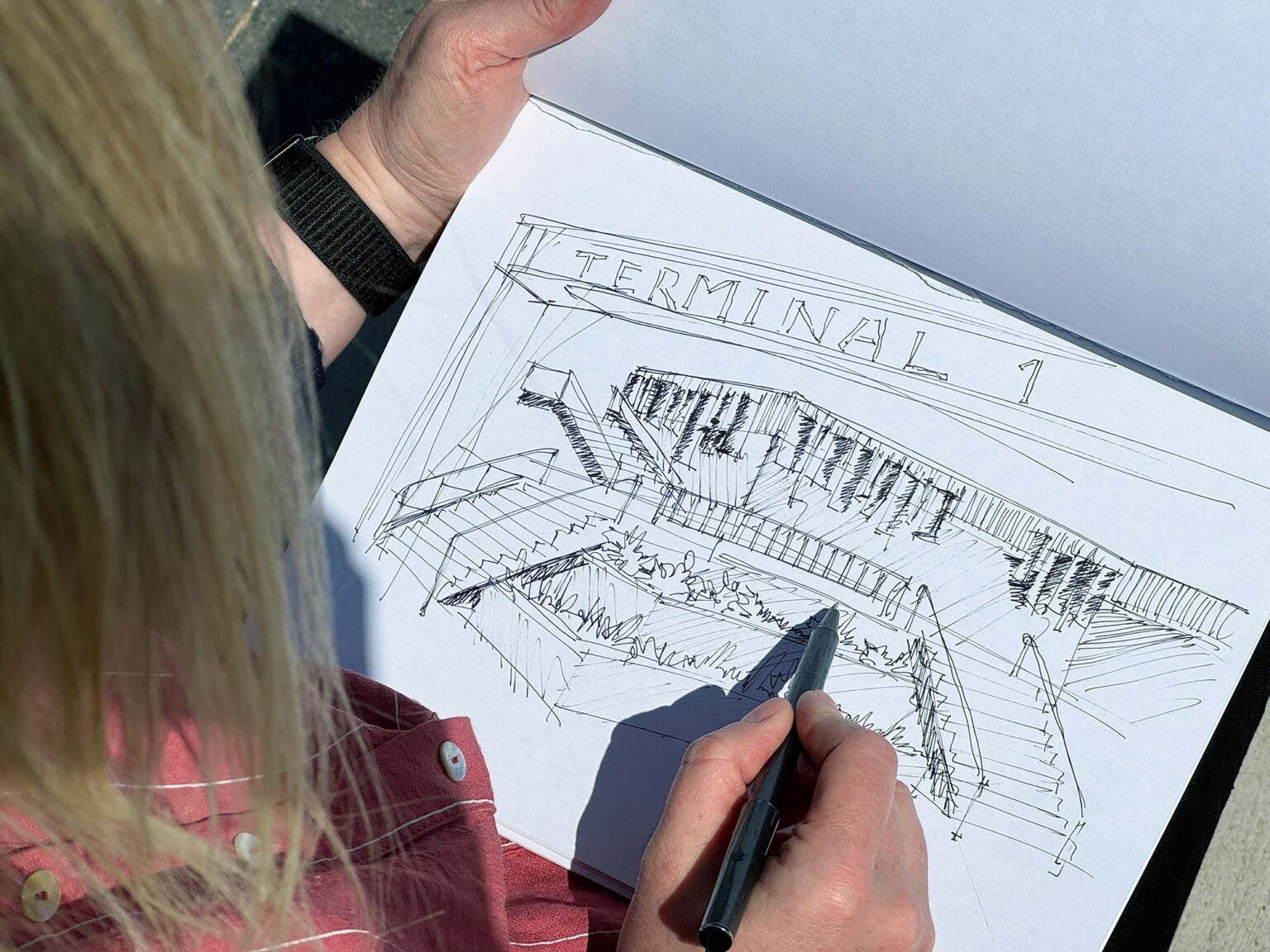 woman sketching Terminal 1 port of vancouver